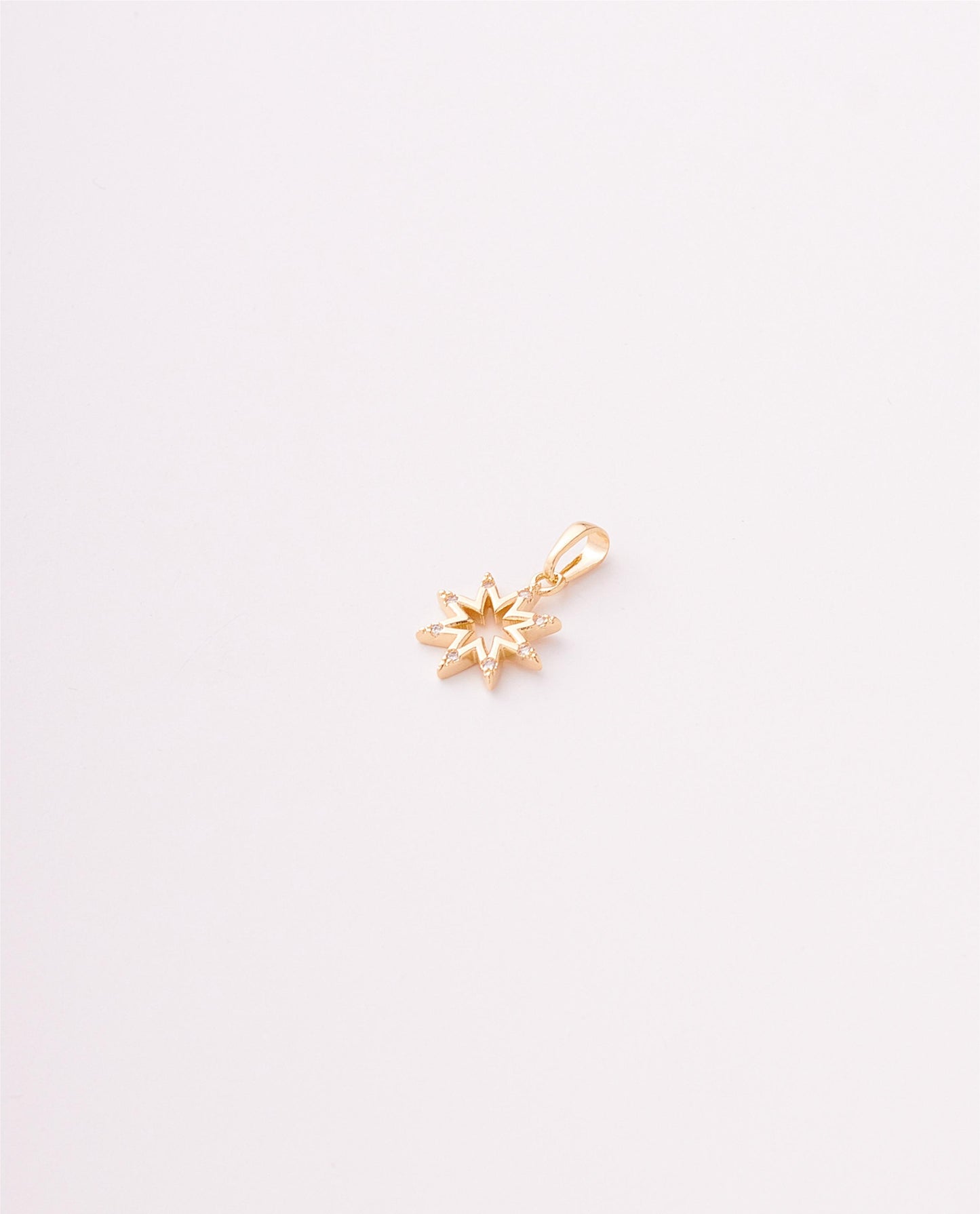 DIJE ESTRELLA CIRCONES DE CRISTAL EN PUNTAS