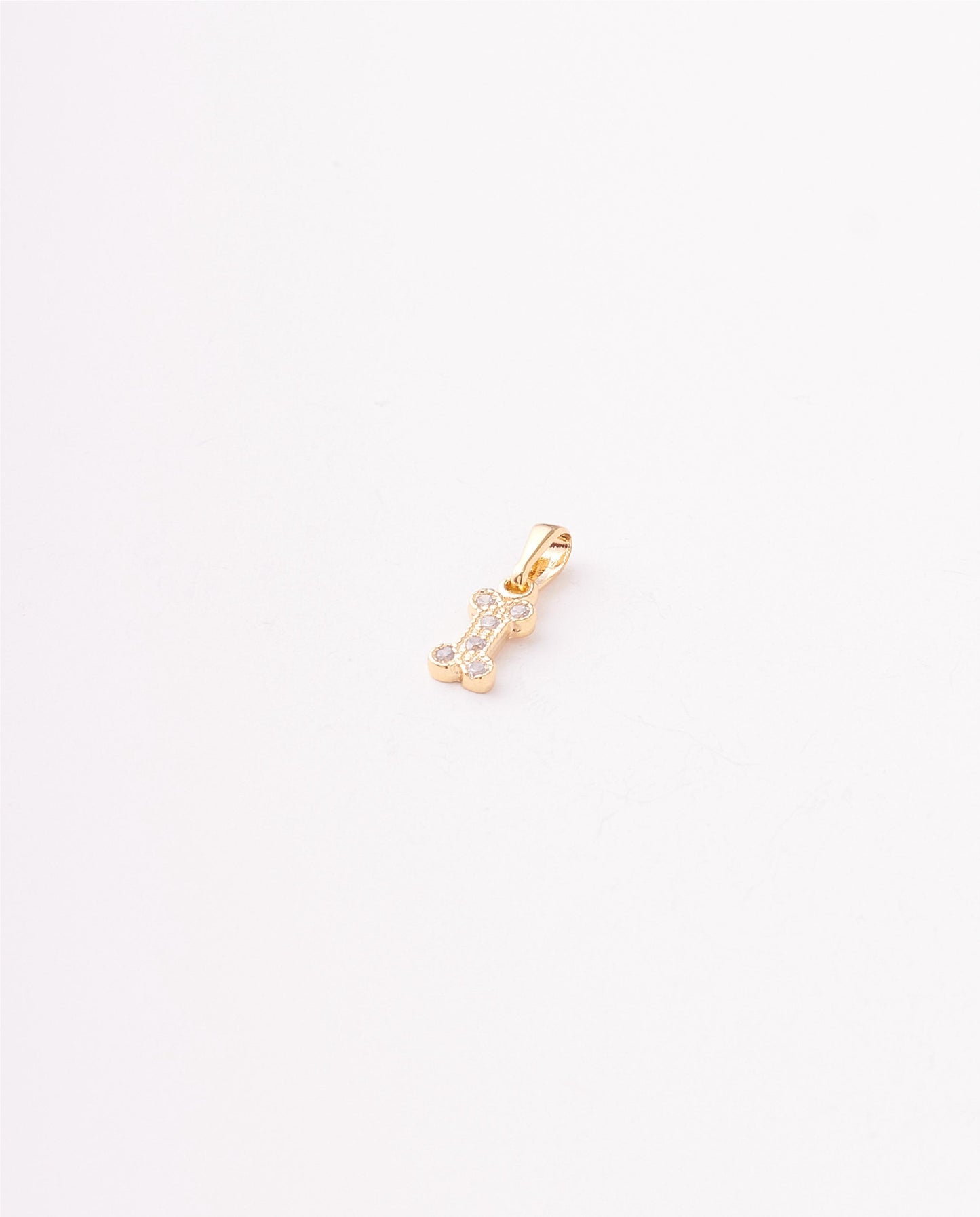 DIJE FIGURA HUESO PERRO CIRCONES - 5X16MM
