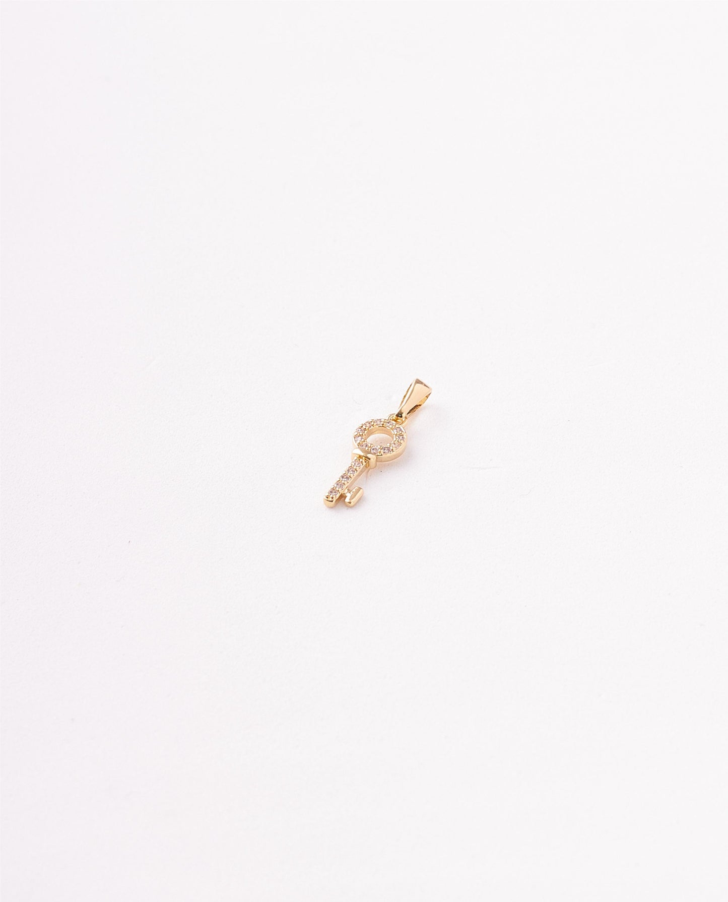 DIJE LLAVE CIRCONES