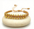 PULSERA TEJIDA DORADA DOBLE CARRIL DIAMANTADA