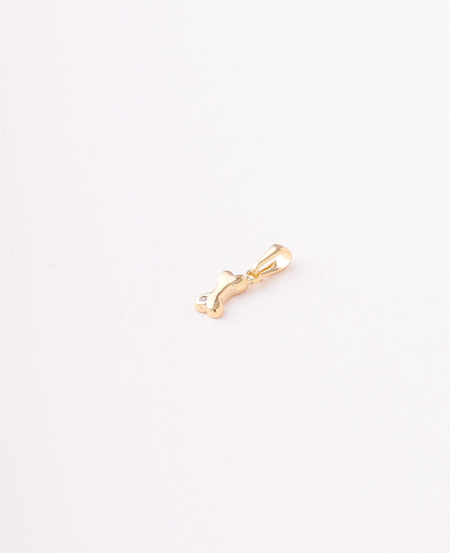 DIJE FIGURA HUESO - 5X16MM